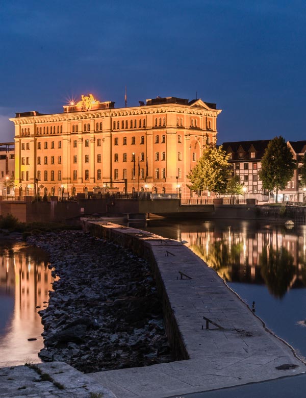 Hamelner Pfortmühle bei Nacht Wertmanagement GmbH - Hamelner Pfortmühle bei Nacht